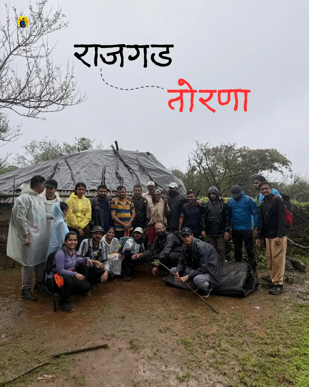 Trekkers walking on lush green mountain ridge connecting Rajgad to Torna Fort