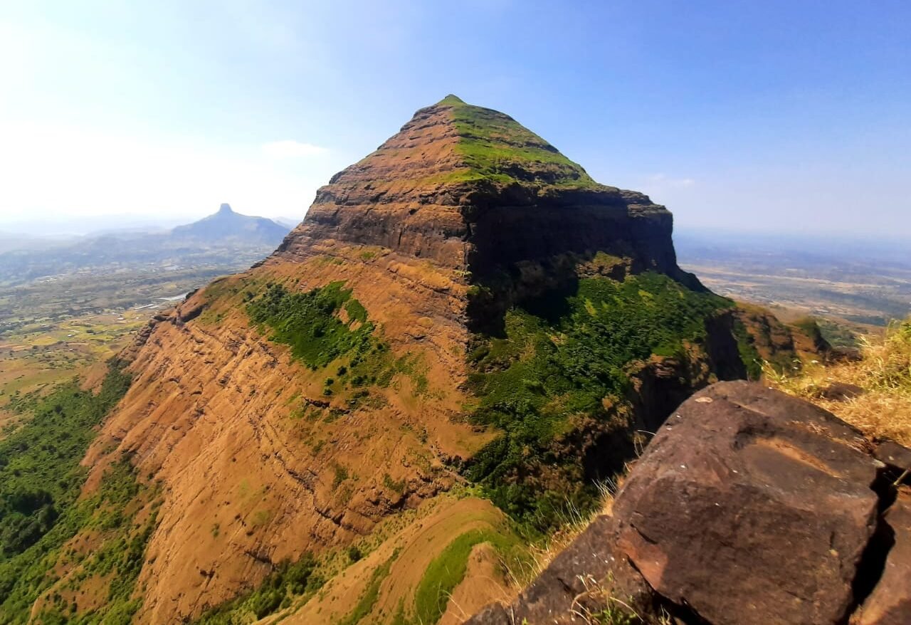 Salher fort summit seen from Salota fort in the Nashik Sahyadri