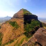 Salher fort summit seen from Salota fort in the Nashik Sahyadri