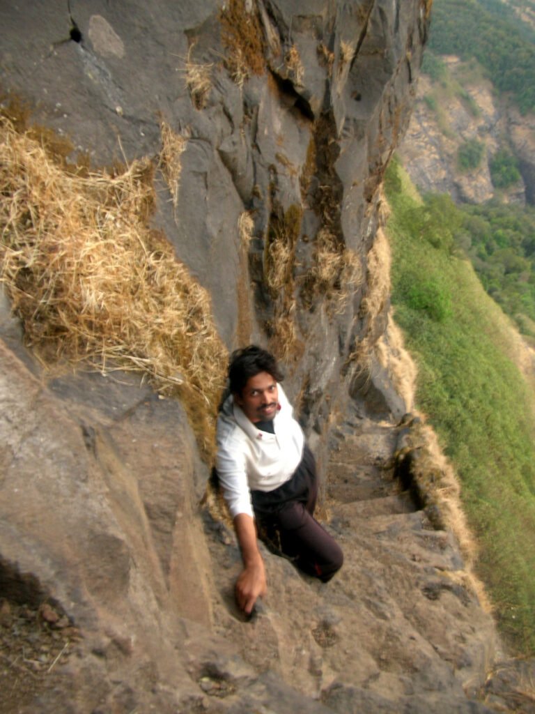 Steep rock-cut steps on Alang fort in the Sahyadri
