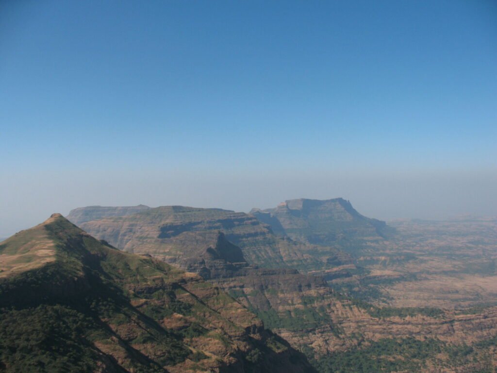 Alang, Madan and Kulang forts seen from Kalsubai