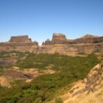 Alang, Madan and Kulang forts seen together as a rocky range in the Kalsubai range